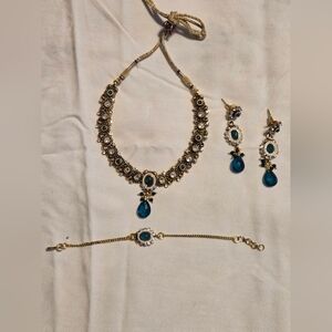 Indian Artificial Set Inclues Necklas, Earrings And a Bracelet.